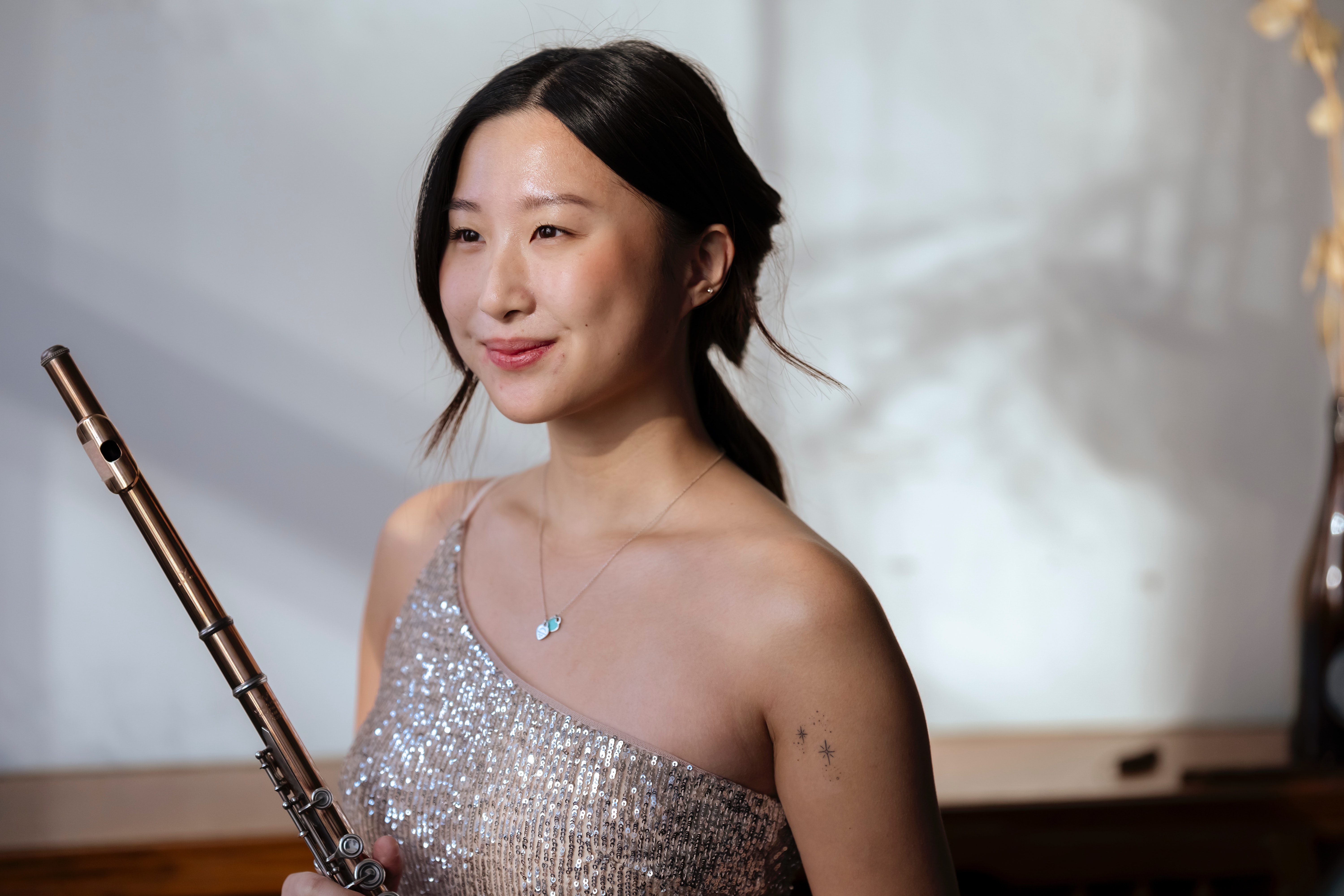 pexels Asian woman flute